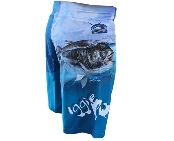 blue board shorts with a GT on it