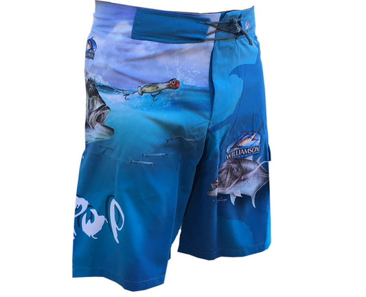 blue board shorts with a GT on it